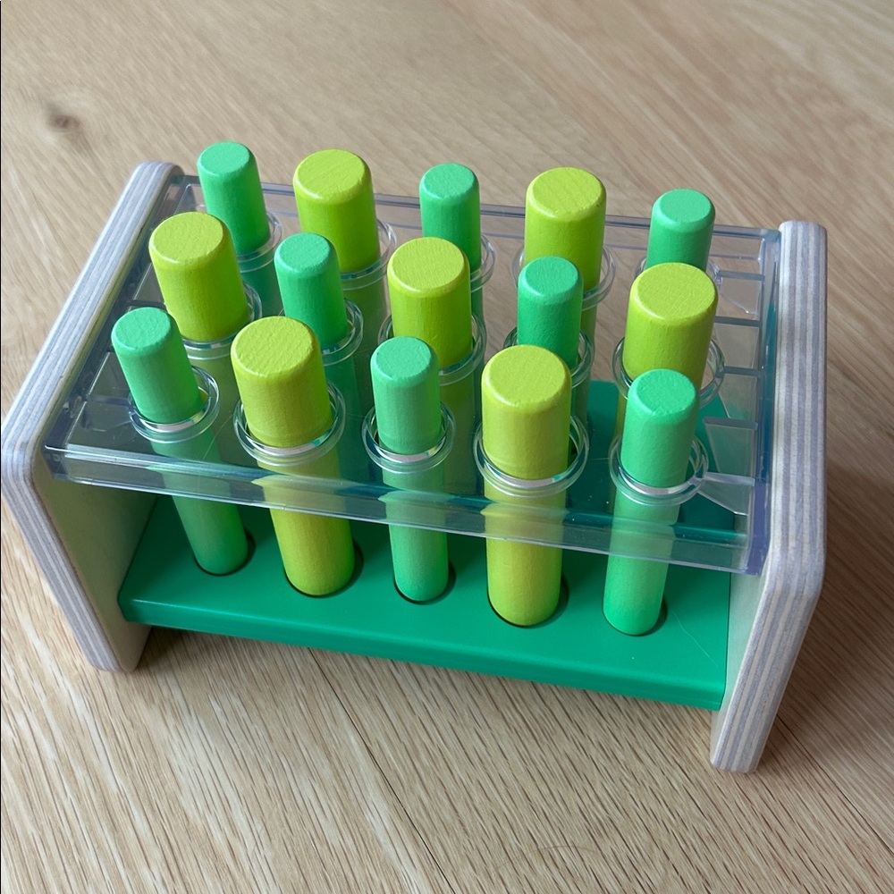 Lovevery posting stand stick toy